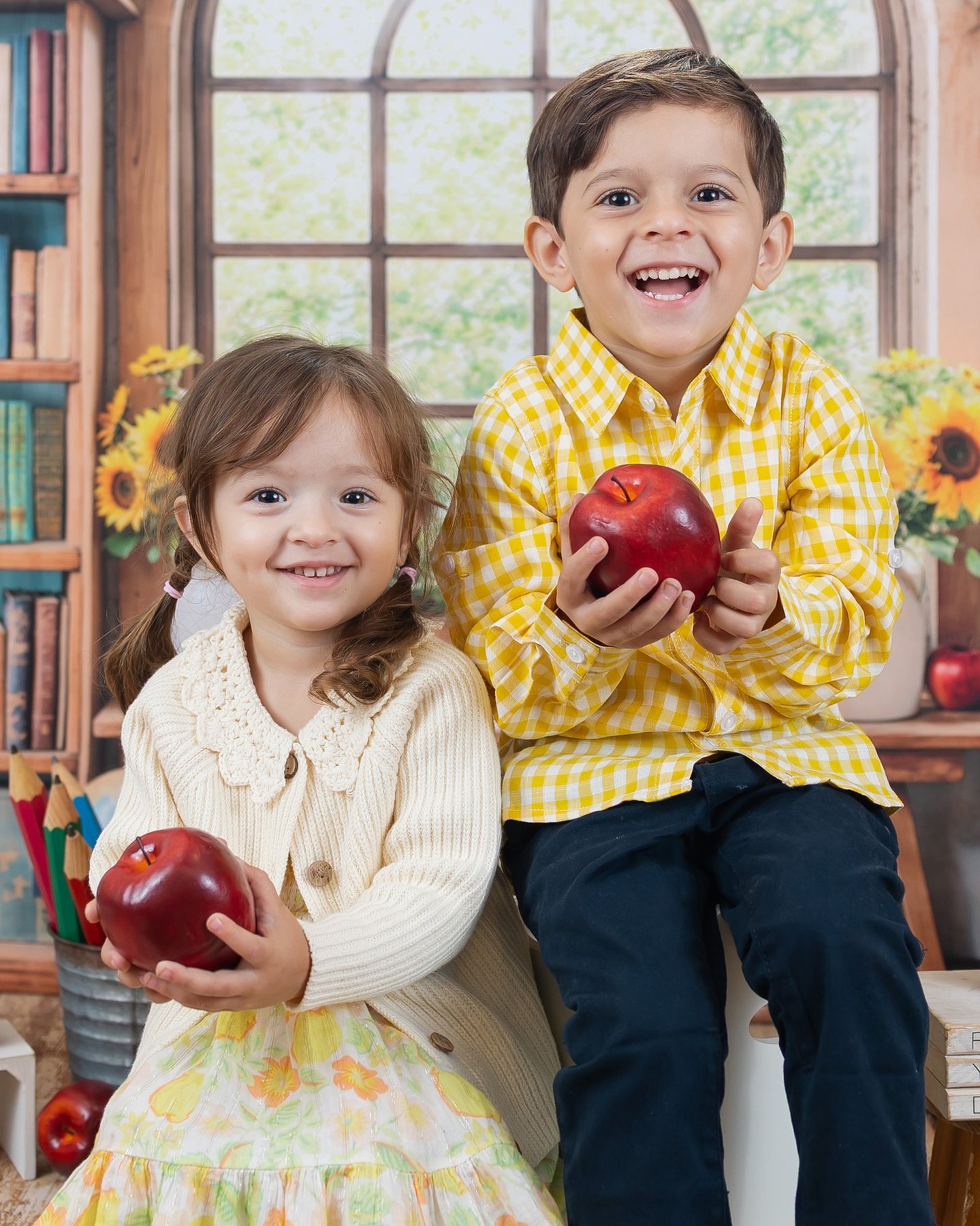 Siblings photographed by Lil' Angels Photography Austin in a warm school portrait set